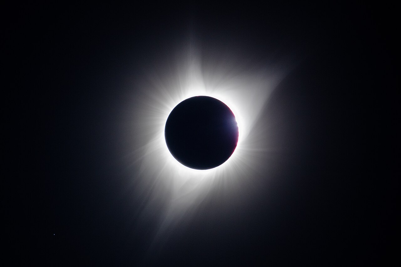 Each bead is sunlight reaching the observer through one lunar valley, so the beads measure the limb profile directly, at the position angles where they appear. Totality begins only when the last of them closes, which is why a prediction that assumes a round Moon states the wrong second. National Park Service / Jacob W. Frank, Craters of the Moon, Idaho, 2017 August 21 11.